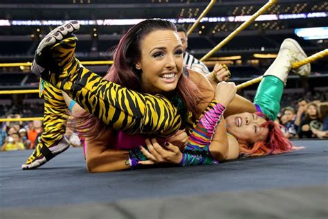 Peyton Royce unconscious and pinned